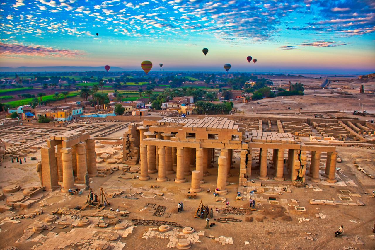 Hot Air Balloon at Sunrise in over Ruins in Luxor Egypt