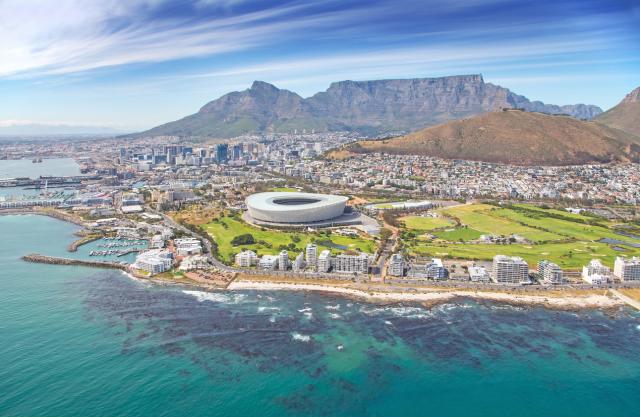 Aerial photo of Cape Town Stadium and CBD with Table Mountain in the background