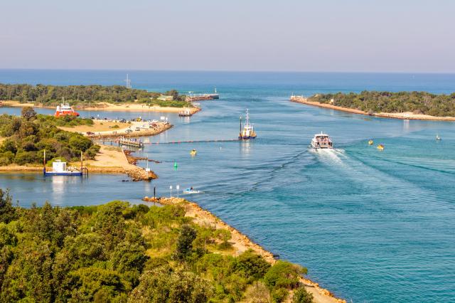 View of the Bullock and Rigby Islands and a man-made entrance into the Gippsland Lakes from the Lake Entrance Lookout - Lakes Entrance, Victoria, Australia