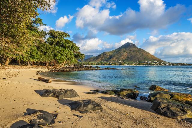 Rocky and sandy shore in Tamarin Bay