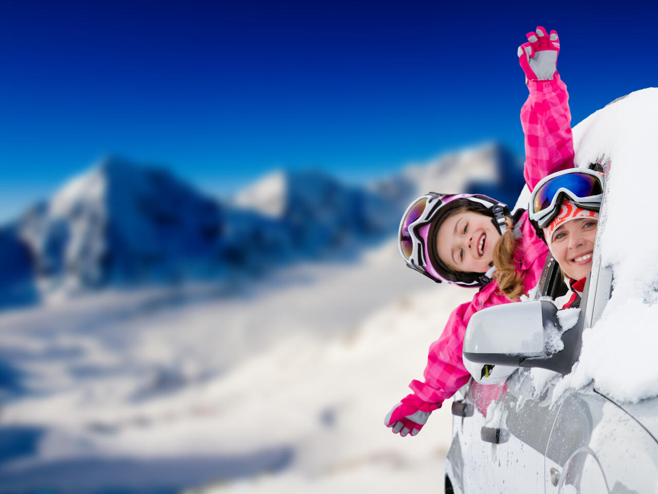Winter holiday - happy family on the road for winter holidays
